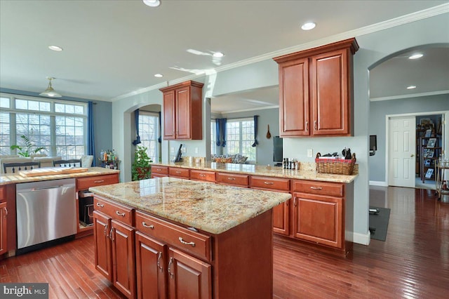 704 Goddard Dr, York, PA 17402 - kitchen with stainless steel dishwasher, arched walkways, ornamental molding, and dark wood finished floors