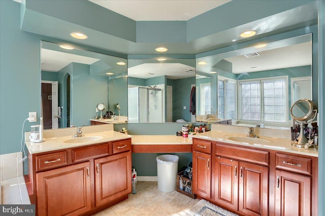704 Goddard Dr, York, PA 17402 - bathroom featuring a shower stall, recessed lighting, visible vents, and a sink