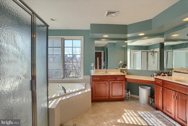 704 Goddard Dr, York, PA 17402 - full bath with vanity, a stall shower, tile patterned floors, visible vents, and a bath