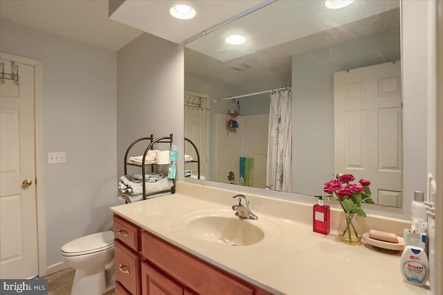 704 Goddard Dr, York, PA 17402 - full bathroom featuring a shower with shower curtain, toilet, recessed lighting, vanity, and tile patterned flooring