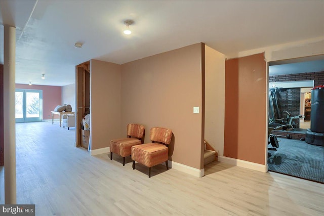704 Goddard Dr, York, PA 17402 - living area featuring baseboards, wood finished floors, and stairs