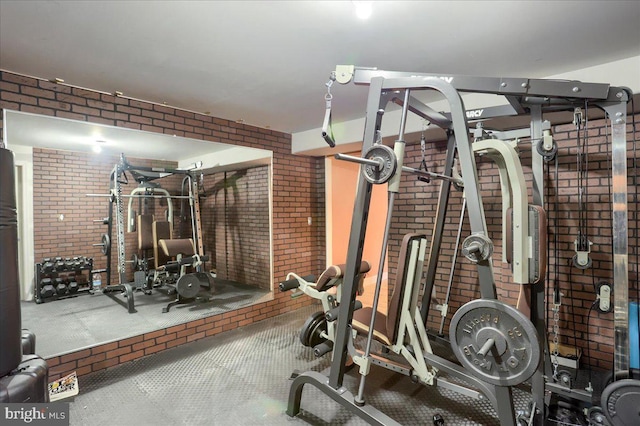 704 Goddard Dr, York, PA 17402 - exercise room with brick wall