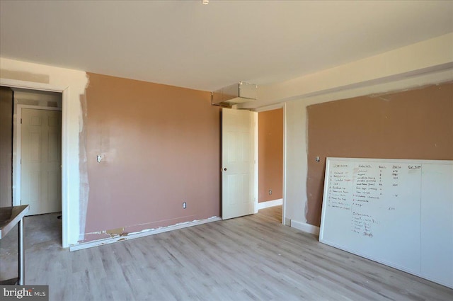 704 Goddard Dr, York, PA 17402 - unfurnished bedroom featuring a closet, baseboards, and wood finished floors