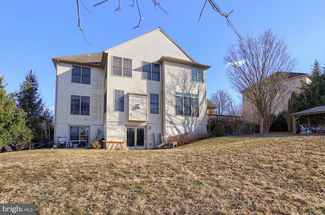 704 Goddard Dr, York, PA 17402 - rear view of house with central air condition unit and a lawn