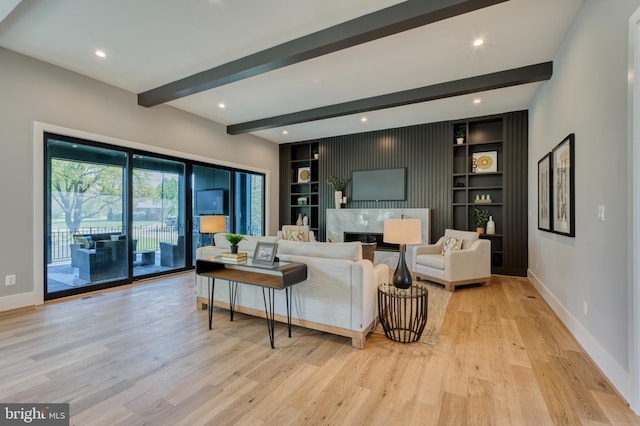 1127 Guilford Ct, Mclean, VA 22101 - living area with light wood-type flooring, baseboards, recessed lighting, beam ceiling, and built in shelves
