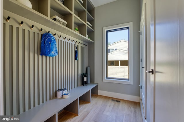 1127 Guilford Ct, Mclean, VA 22101 - mudroom with light wood finished floors, baseboards, and visible vents