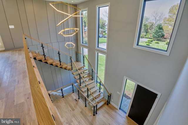 1127 Guilford Ct, Mclean, VA 22101 - foyer entrance featuring a high ceiling, wood finished floors, baseboards, and stairway
