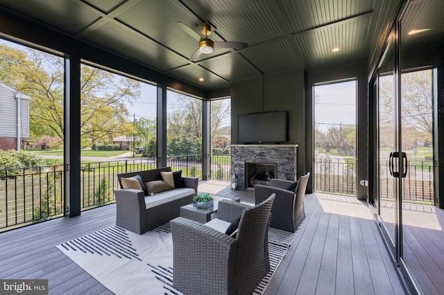 1127 Guilford Ct, Mclean, VA 22101 - sunroom featuring an outdoor living space with a fireplace and a ceiling fan