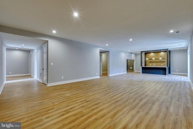 1127 Guilford Ct, Mclean, VA 22101 - unfurnished living room featuring recessed lighting, light wood finished floors, and baseboards