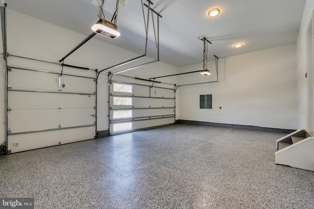 1127 Guilford Ct, Mclean, VA 22101 - garage with baseboards, a garage door opener, and electric panel
