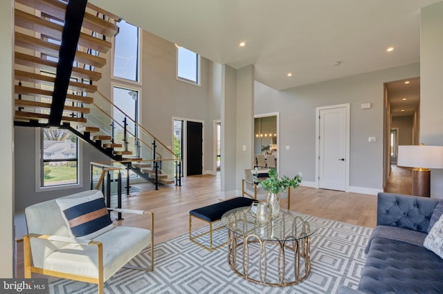 1127 Guilford Ct, Mclean, VA 22101 - living room featuring wood finished floors, recessed lighting, baseboards, and stairs
