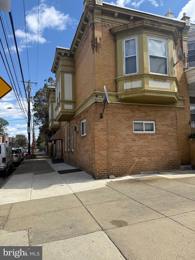 4561 N Camac St, Philadelphia, PA 19140 - view of side of home with brick siding