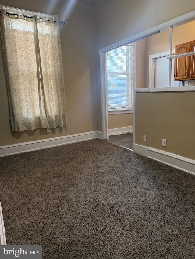 4561 N Camac St, Philadelphia, PA 19140 - interior space featuring dark colored carpet and baseboards