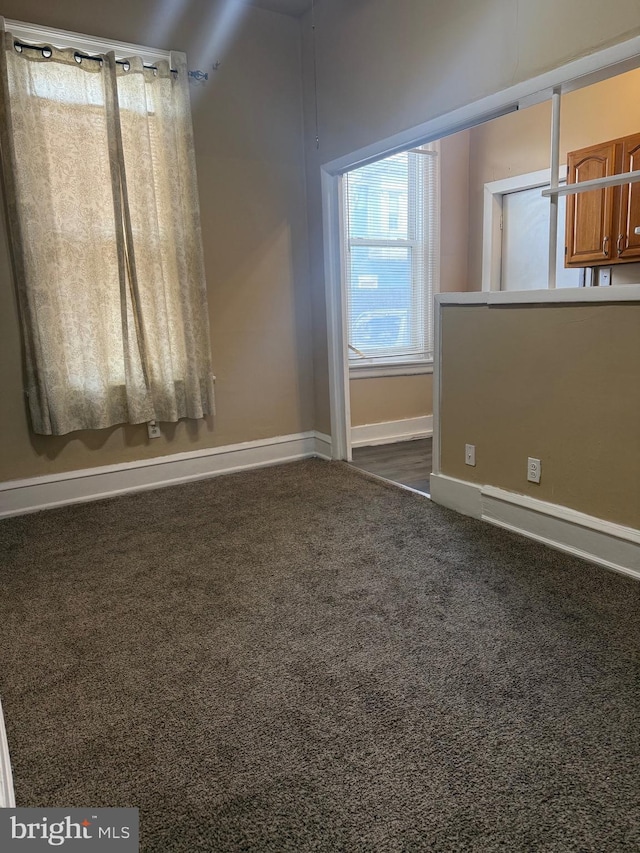 4561 N Camac St, Philadelphia, PA 19140 - spare room with dark carpet and baseboards