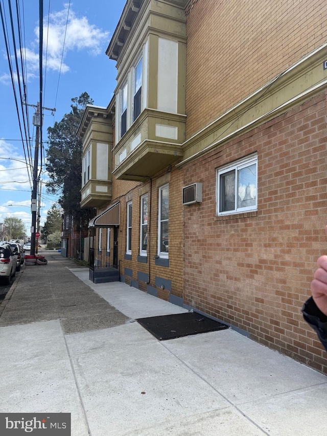 4561 N Camac St, Philadelphia, PA 19140 - view of home's exterior with crawl space and brick siding