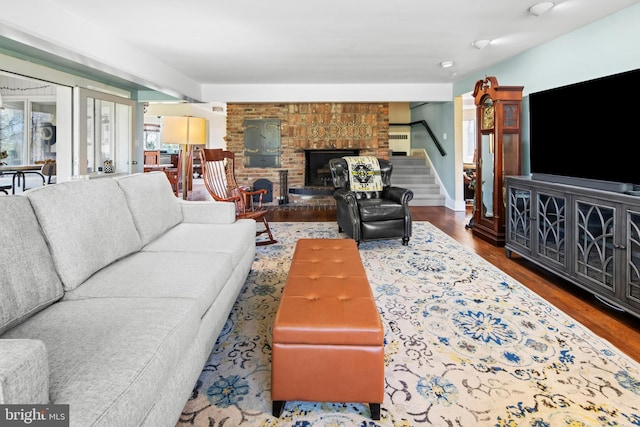 2984 N Sugan Rd, New Hope, PA 18938 - living area with a fireplace, stairs, wood finished floors, and plenty of natural light