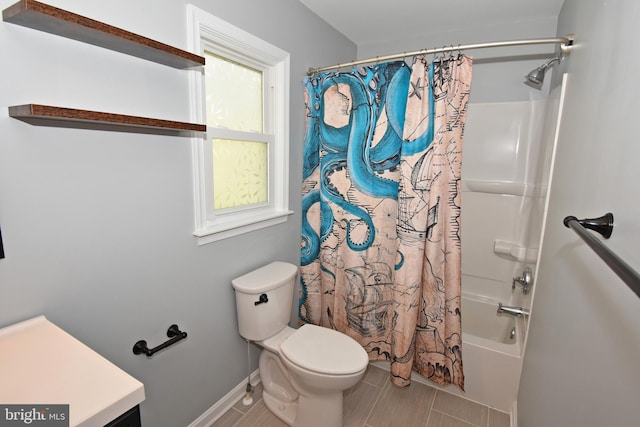 bathroom with baseboards, toilet, and shower / bath combination with curtain