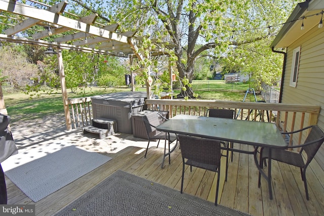 wooden deck featuring outdoor dining area, a hot tub, and a pergola
