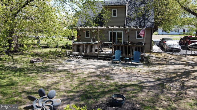 6190 Ayrshire Dr, Salisbury, MD 21801 - back of property with a deck, a pergola, and roof with shingles