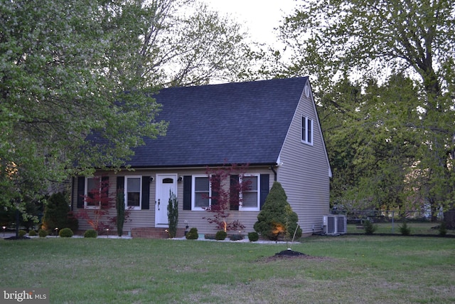 6190 Ayrshire Dr, Salisbury, MD 21801 - cape cod house featuring roof with shingles and cooling unit