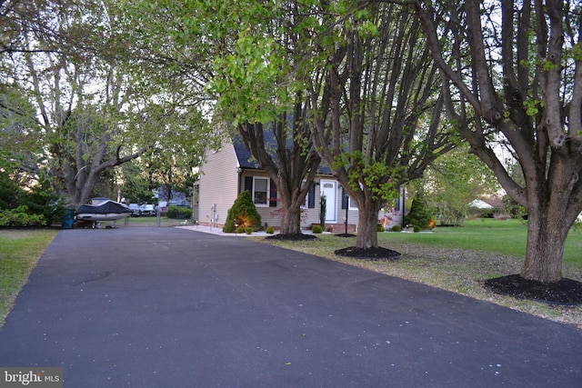 6190 Ayrshire Dr, Salisbury, MD 21801 - obstructed view of property with asphalt driveway and a front lawn