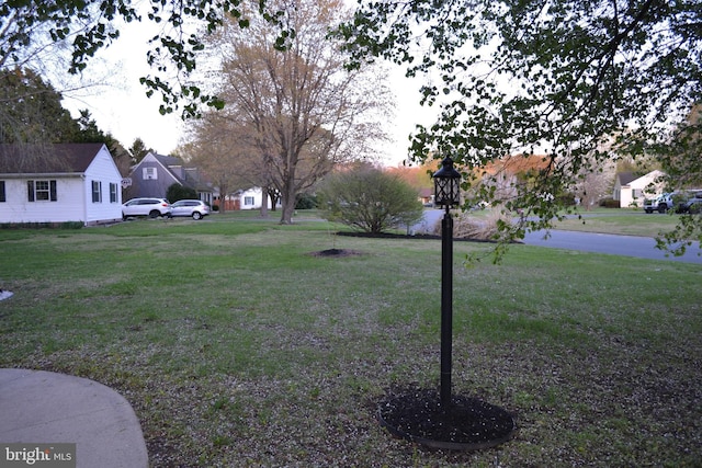6190 Ayrshire Dr, Salisbury, MD 21801 - view of green lawn featuring a residential view