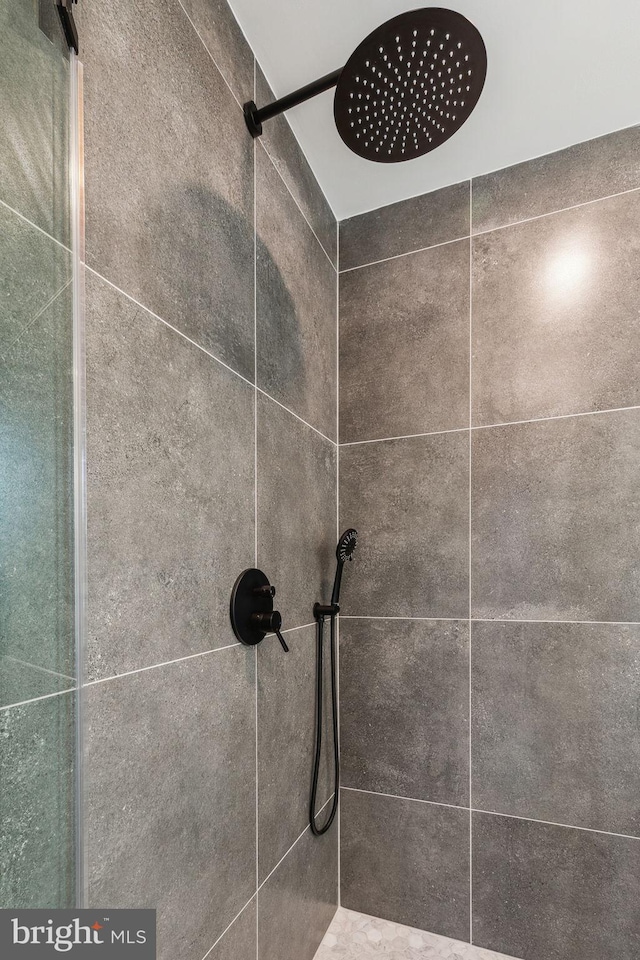 room details with a tile shower