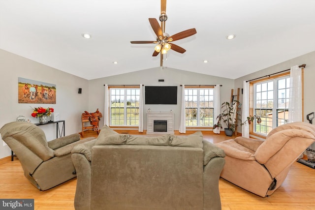 17449 Irishtown Rd, Emmitsburg, MD 21727 - living room featuring ceiling fan, light wood-style floors, a wealth of natural light, and vaulted ceiling