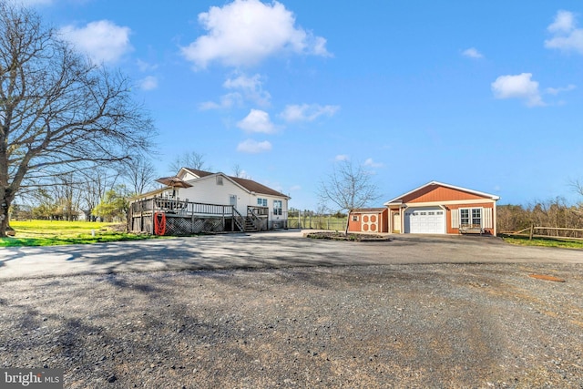 17449 Irishtown Rd, Emmitsburg, MD 21727 - view of front of home with driveway and a wooden deck