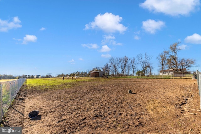 17449 Irishtown Rd, Emmitsburg, MD 21727 - view of yard featuring a rural view, an outdoor structure, and fence