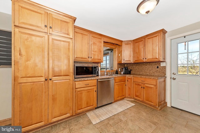17449 Irishtown Rd, Emmitsburg, MD 21727 - kitchen with plenty of natural light, a sink, decorative backsplash, and appliances with stainless steel finishes