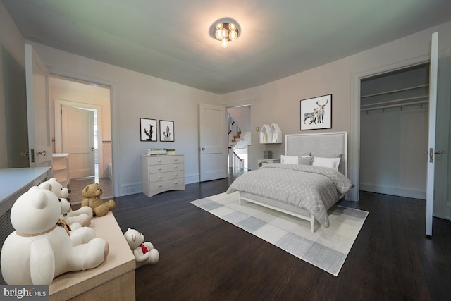 723 S Latches Ln, Merion Station, PA 19066 - bedroom with dark wood-type flooring and a closet