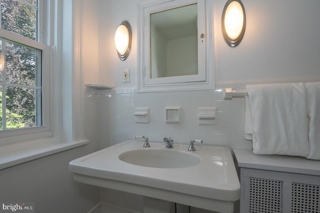 723 S Latches Ln, Merion Station, PA 19066 - bathroom with tile walls, plenty of natural light, and wainscoting