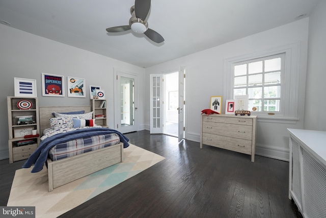 723 S Latches Ln, Merion Station, PA 19066 - bedroom with dark wood-style flooring, a ceiling fan, and french doors