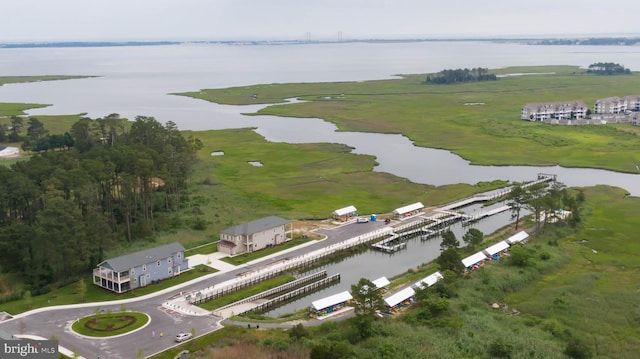 aerial view of property's location featuring a large body of water