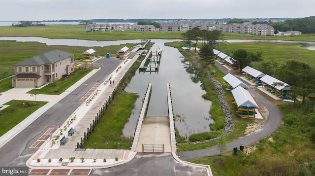 aerial view of a nearby body of water and apartment complex / building