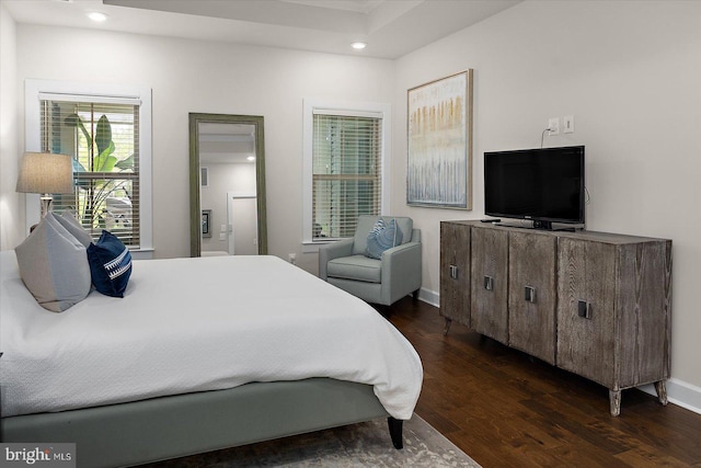 bedroom with dark wood finished floors, recessed lighting, and baseboards