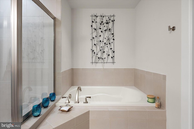 full bathroom featuring a bath