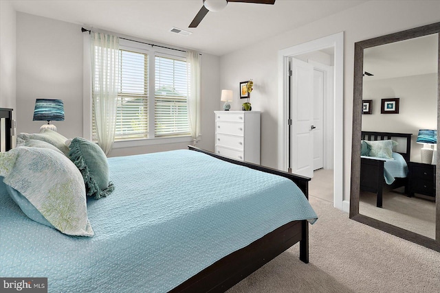 carpeted bedroom with a ceiling fan