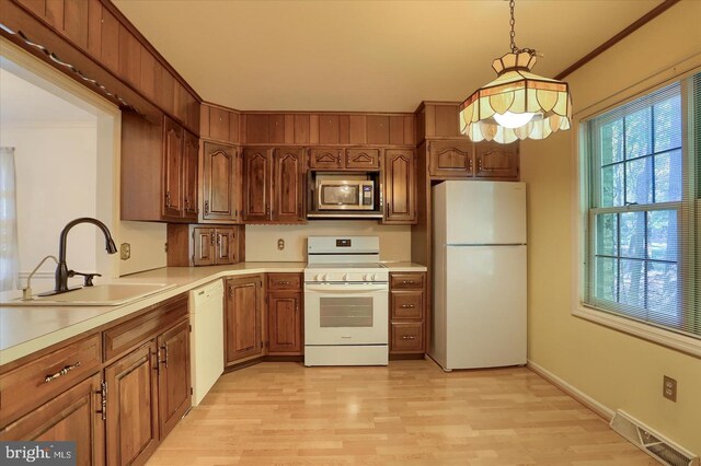 1300 Sand Hill Rd, Hummelstown, PA 17036 - kitchen featuring a sink, visible vents, light wood finished floors, and white appliances