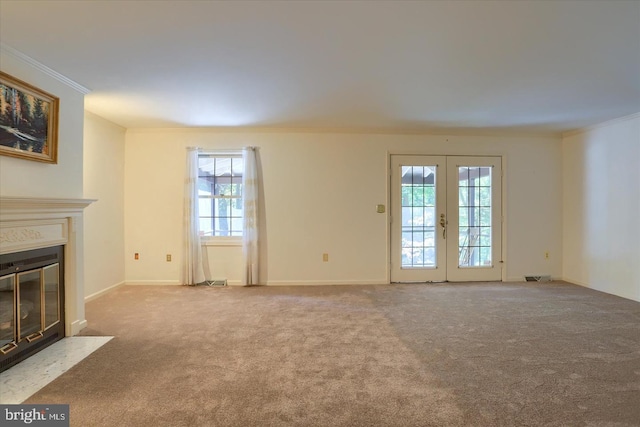 1300 Sand Hill Rd, Hummelstown, PA 17036 - unfurnished living room featuring a fireplace with flush hearth, carpet flooring, visible vents, and crown molding