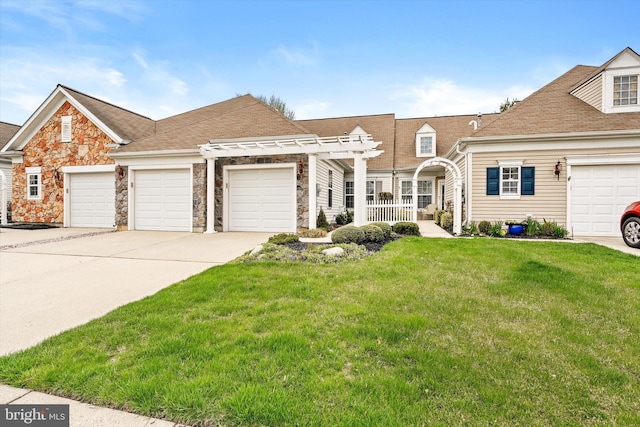 29 Sparrow Dr, Hamilton, NJ 08690 - view of front facade with a front yard, a pergola, stone siding, a garage, and concrete driveway