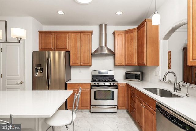 29 Sparrow Dr, Hamilton, NJ 08690 - kitchen featuring wall chimney exhaust hood, a sink, light countertops, appliances with stainless steel finishes, and brown cabinetry