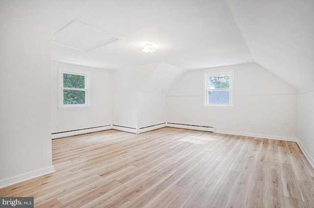 8205 Robin Hood Ct, Towson, MD 21204 - bonus room featuring light wood-type flooring, lofted ceiling, baseboards, and attic access