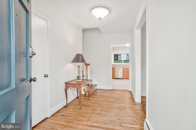 8205 Robin Hood Ct, Towson, MD 21204 - corridor with light wood-type flooring and baseboards