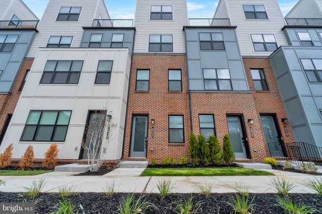 multi unit property with brick siding