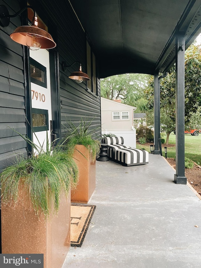 7910 Bayberry Dr, Alexandria, VA 22306 - view of patio / terrace featuring a porch