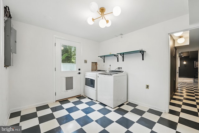 7910 Bayberry Dr, Alexandria, VA 22306 - washroom with separate washer and dryer, light floors, a chandelier, and baseboards