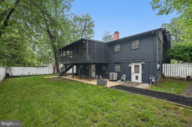 7910 Bayberry Dr, Alexandria, VA 22306 - back of property featuring a sunroom, a chimney, central air condition unit, a patio area, and stairway