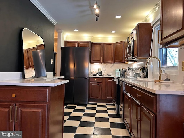 7910 Bayberry Dr, Alexandria, VA 22306 - kitchen with freestanding refrigerator, a sink, stainless steel microwave, light floors, and electric range oven